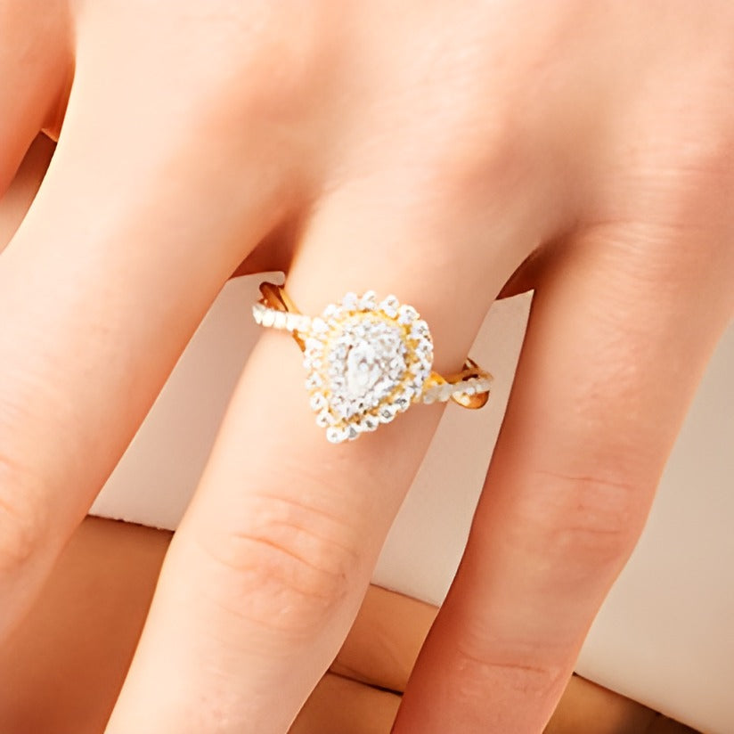 0.75 CT. TW Pear-Shaped Diamond Double Frame Twist Shank Engagement Ring in 10K Gold