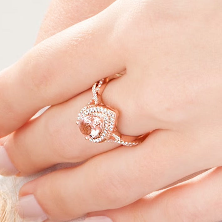 Pear-Shaped Morganite and 0.5 CT. TW Diamond Cascade Frame Crossover Shank Ring in 10K Rose Gold