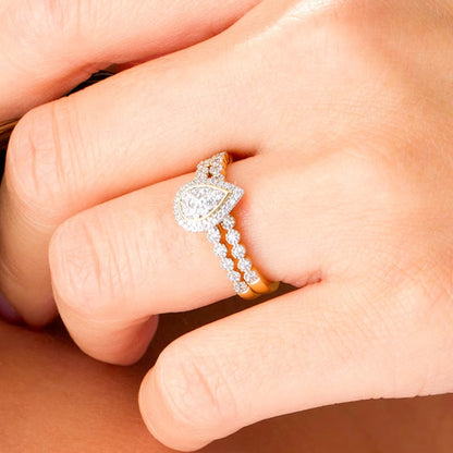 0.33 CT. TW Composite Diamond Pear-Shaped Frame Bridal Set in 10K Gold