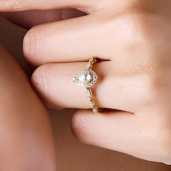 0.5 CT. TW Pear-Shaped Diamond Frame Engagement Ring in 14K Yellow Gold (I/I1)