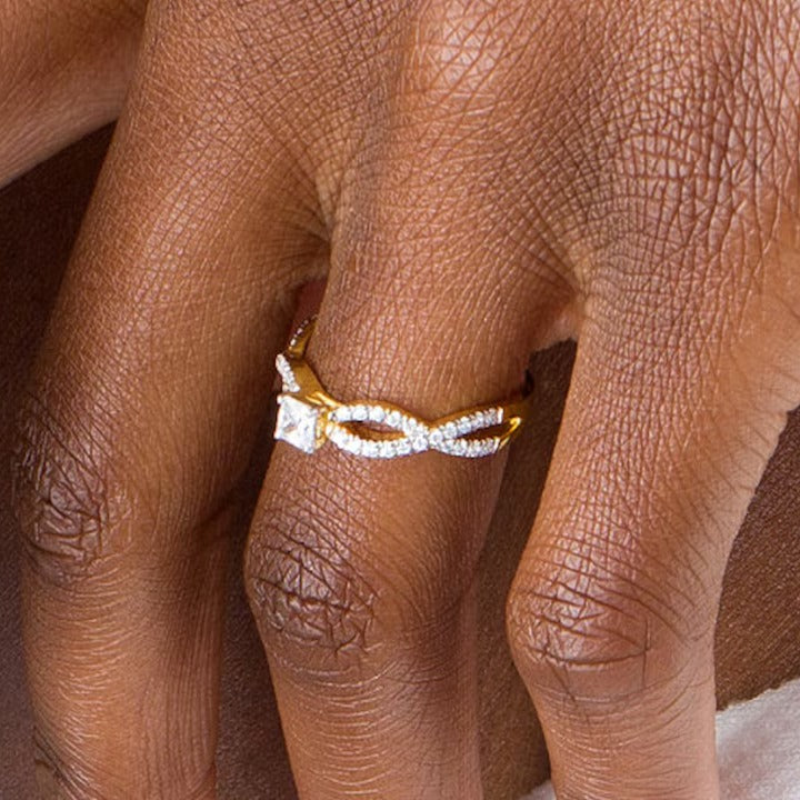 0.5 CT. TW Princess-Cut Diamond Infinity Twist Shank Engagement Ring in 10K Gold