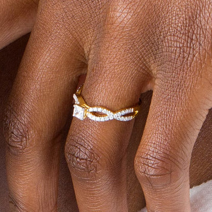0.5 CT. TW Princess-Cut Diamond Infinity Twist Shank Engagement Ring in 10K Gold