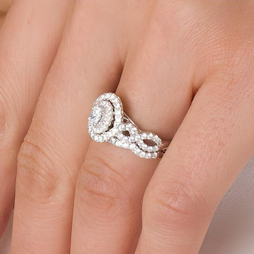 1.0 CT. TW Oval Diamond Double Frame Twist Shank Bridal Set in 14K White Gold