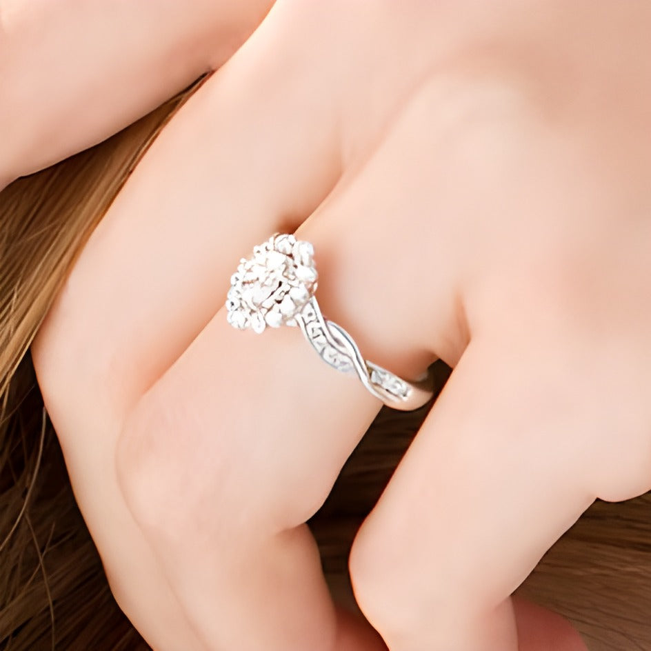 0.75 CT. TW Oval Diamond Frame Twist Shank Vintage-Style Engagement Ring in 10K White Gold