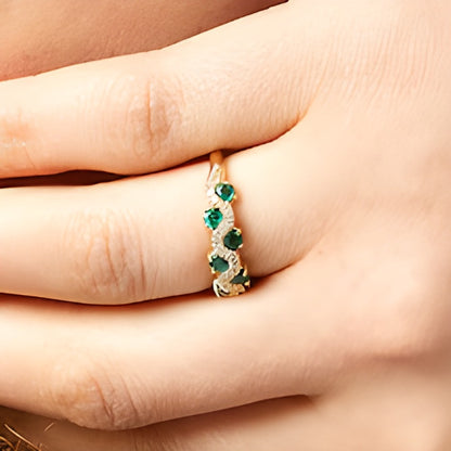 3.0mm Emerald and 0.17 CT. TW Diamond Staggered Wave Band in 14K Gold