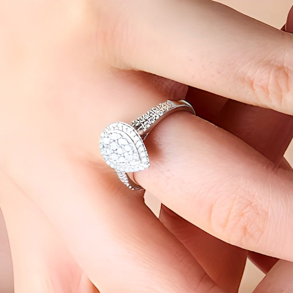 0.5 CT. TW Pear-Shaped Multi-Diamond Frame Split Shank Engagement Ring in 10K White Gold