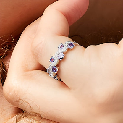3.0mm Tanzanite and 0.17 CT. TW Diamond Staggered Wave Band in 14K White Gold