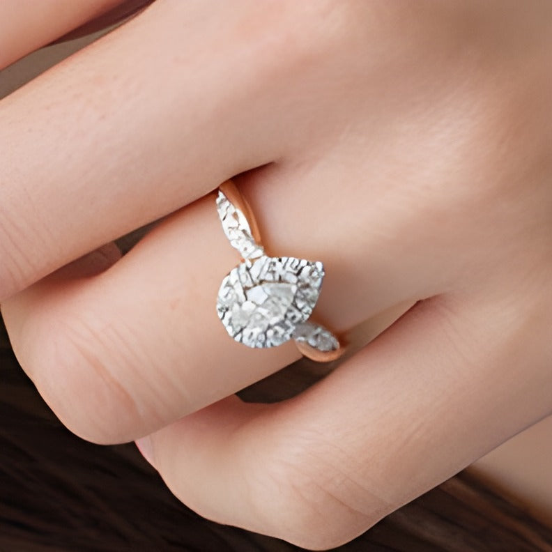 0.88 CT. TW Pear-Shaped Diamond Frame Twist Shank Engagement Ring in 10K Rose Gold