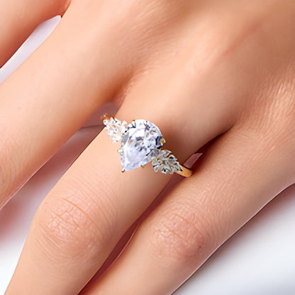 2.33 CT. TW Pear-Shaped Lab-Grown Diamond Leaf-Sides Engagement Ring in 14K Gold (F/VS2)