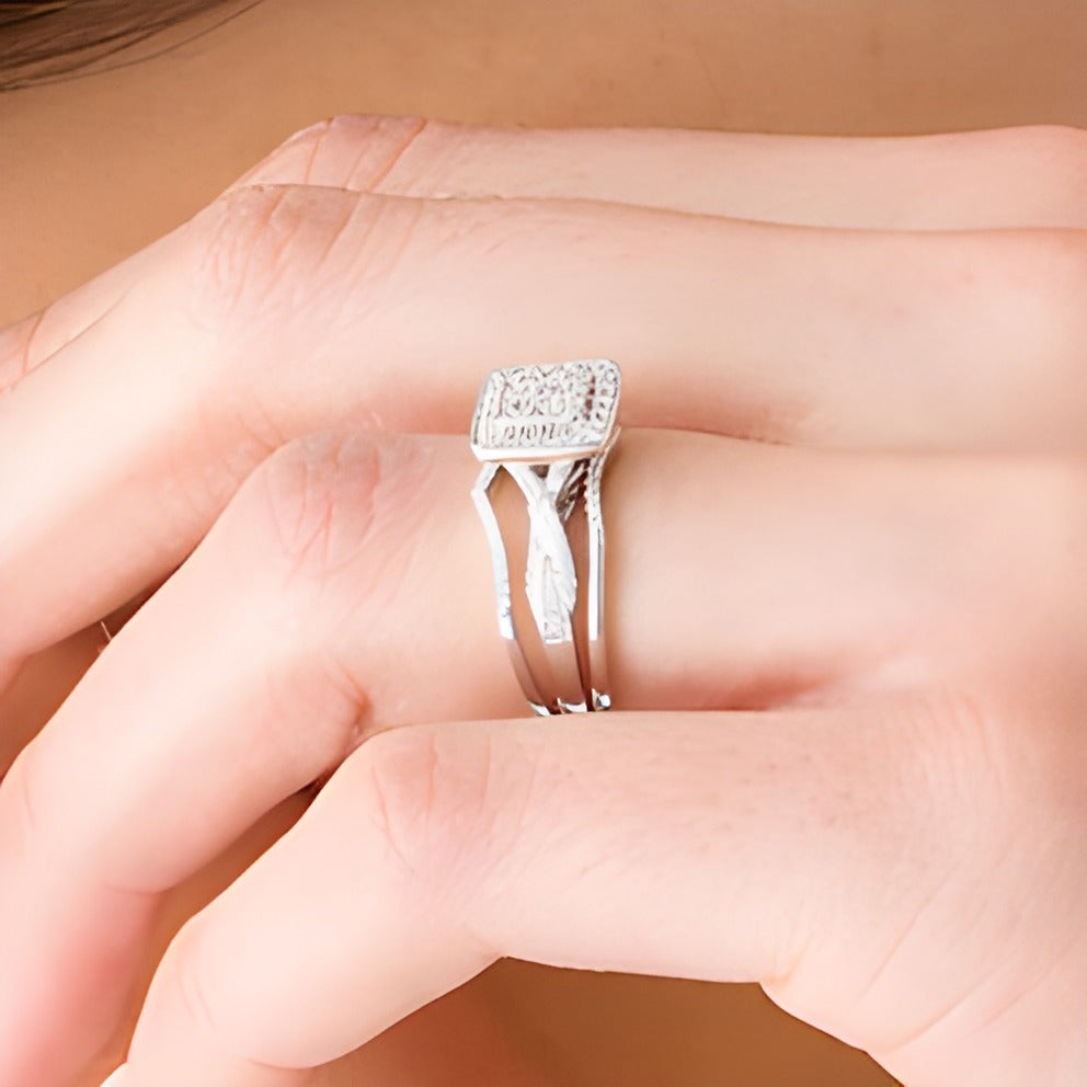 0.63 CT. TW Composite Diamond Square Frame Twist Shank Three Piece Bridal Set in Sterling Silver