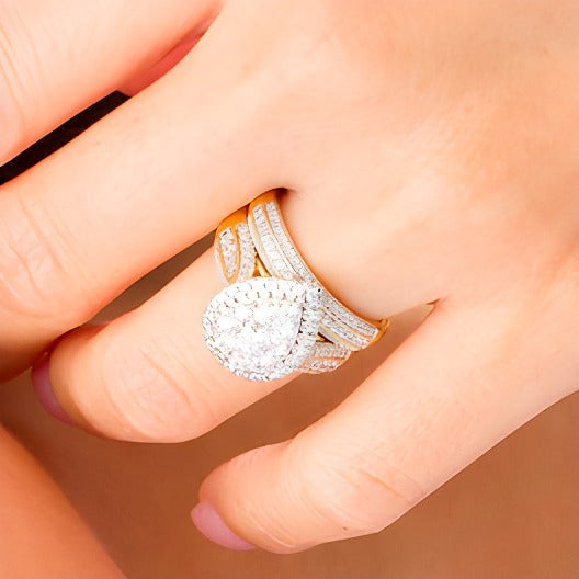 1.5 CT. TW Pear-Shaped Multi-Diamond Frame Multi-Row Bridal Set in 10K Gold