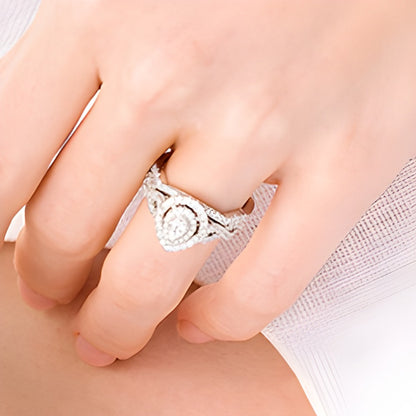 1.0 CT. TW Pear-Shaped Diamond Double Frame Twist Shank Bridal Set in 14K White Gold