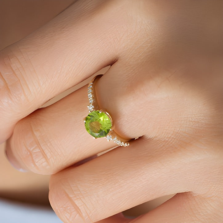 7.0mm Peridot and 0.13 CT. TW Diamond Engagement Ring in 10K Gold