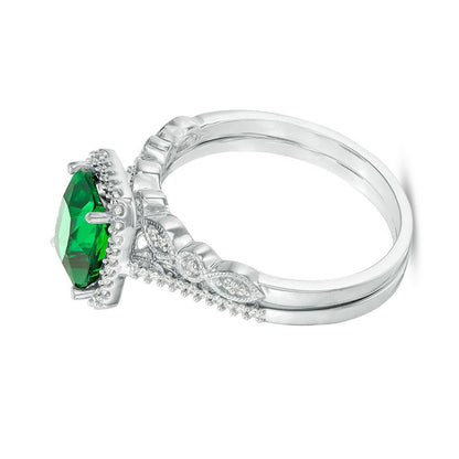 Cushion-Cut Lab-Created Emerald and 0.2 CT. TW Diamond Octagon Frame Vintage-Style Bridal Set in Sterling Silver