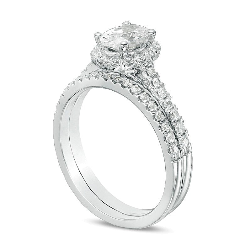 1.2 CT. TW Oval center Diamond Frame Bridal Set in 14K White Gold (I/SI2)