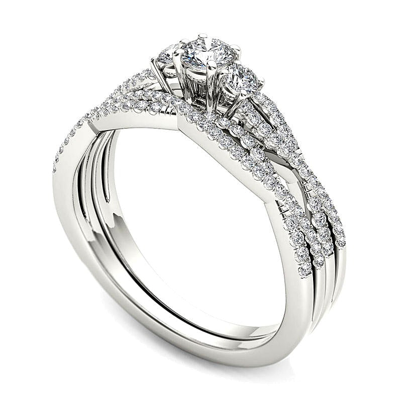 0.5 CT. TW Diamond Three Stone Twist Bridal Set in 14K White Gold