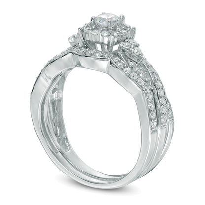0.63 CT. TW Diamond Frame Twist Bridal Set in 10K White Gold