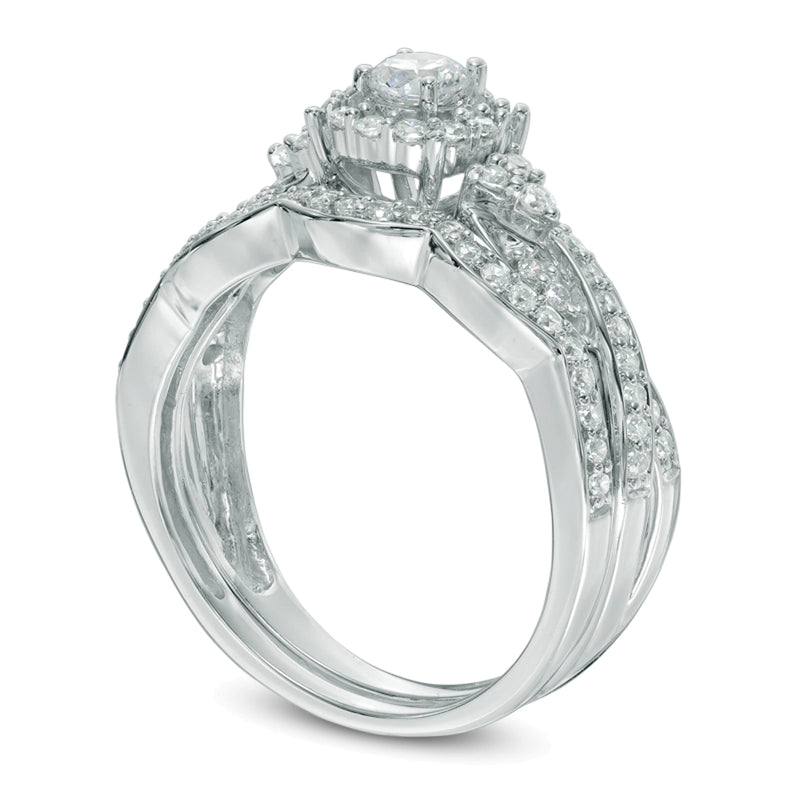 0.63 CT. TW Diamond Frame Twist Bridal Set in 10K White Gold