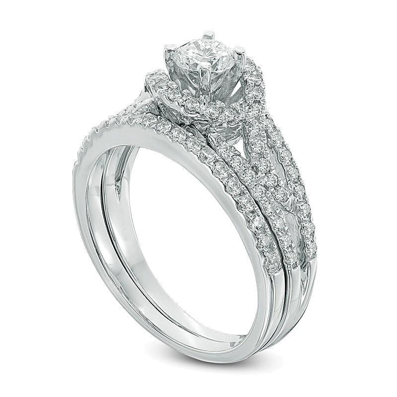 0.75 CT. TW Diamond Frame Split Shank Bridal Set in 10K White Gold