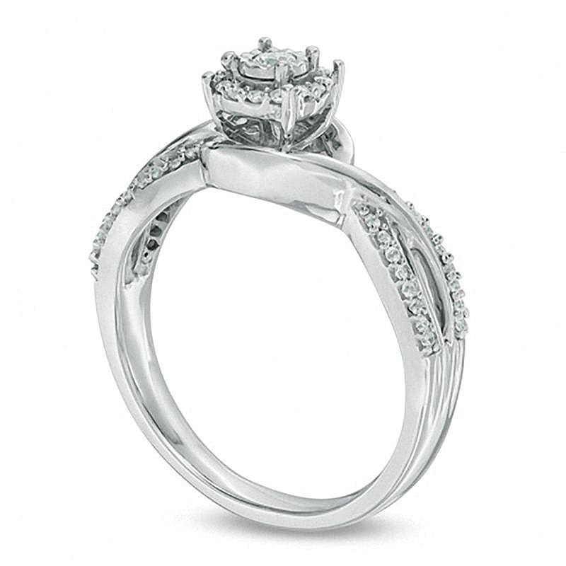 0.25 CT. TW Diamond Swirl Twist Shank Promise Ring in Sterling Silver