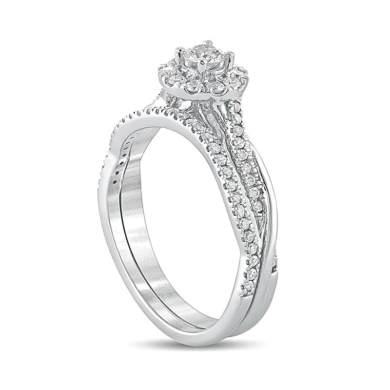 0.5 CT. TW Diamond Frame Twist Shank Bridal Set in 10K White Gold