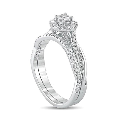 0.5 CT. TW Diamond Frame Twist Shank Bridal Set in 10K White Gold