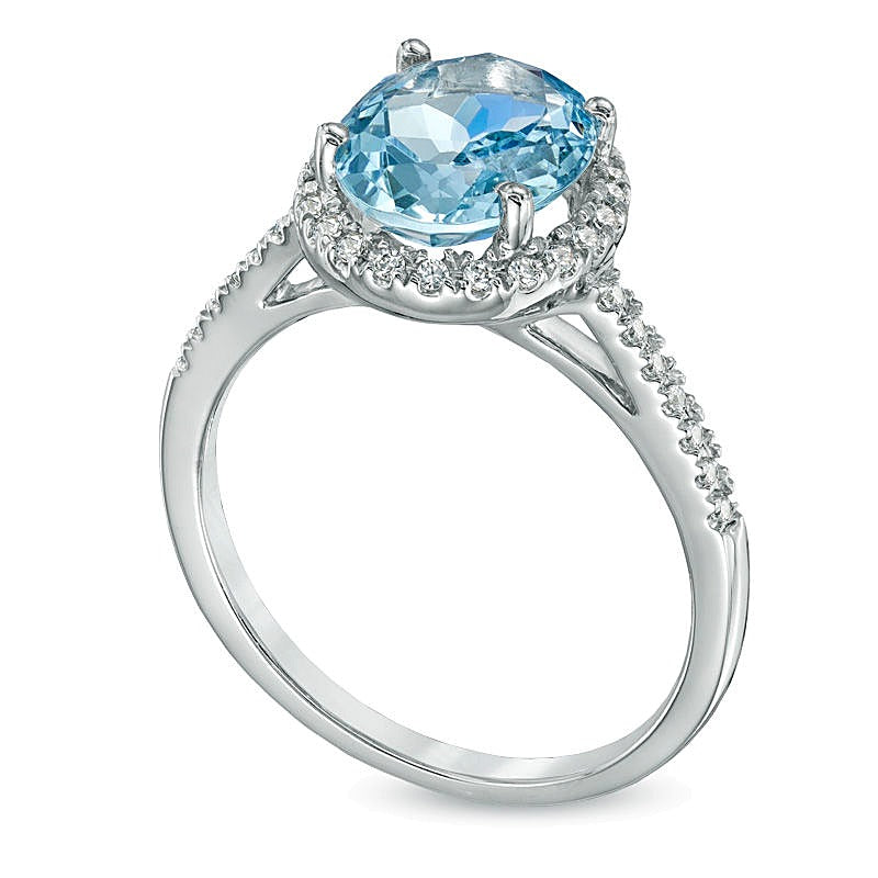 Oval Aquamarine and 0.2 CT. TW Diamond Frame Engagement Ring in 10K White Gold