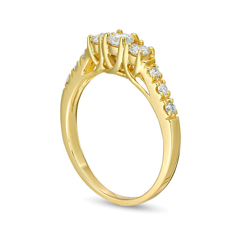 0.5 CT. TW Diamond Three Stone Engagement Ring in 14K Gold (I/I3)