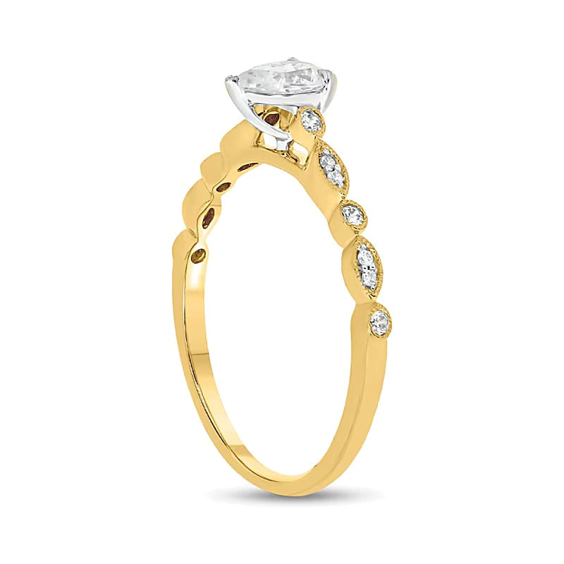 0.5 CT. TW Pear-Shaped Diamond Vintage-Style Scallop Shank Engagement Ring in 10K Gold (I/I2)