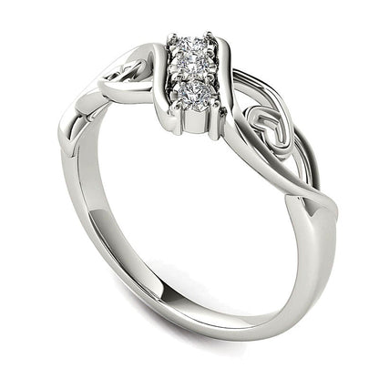 0.1 CT. TW Diamond Three Stone Bypass with Hearts Ring in 14K White Gold