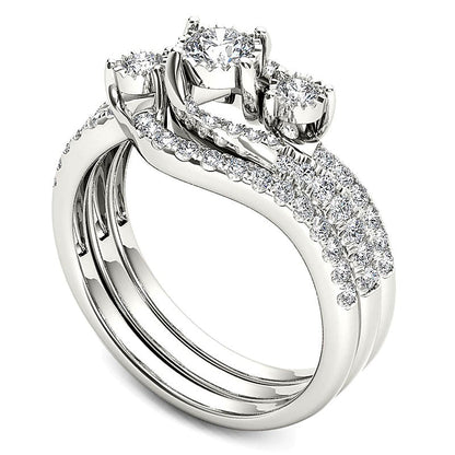 0.75 CT. TW Diamond Three Stone Bypass Three Piece Bridal Set in 14K White Gold
