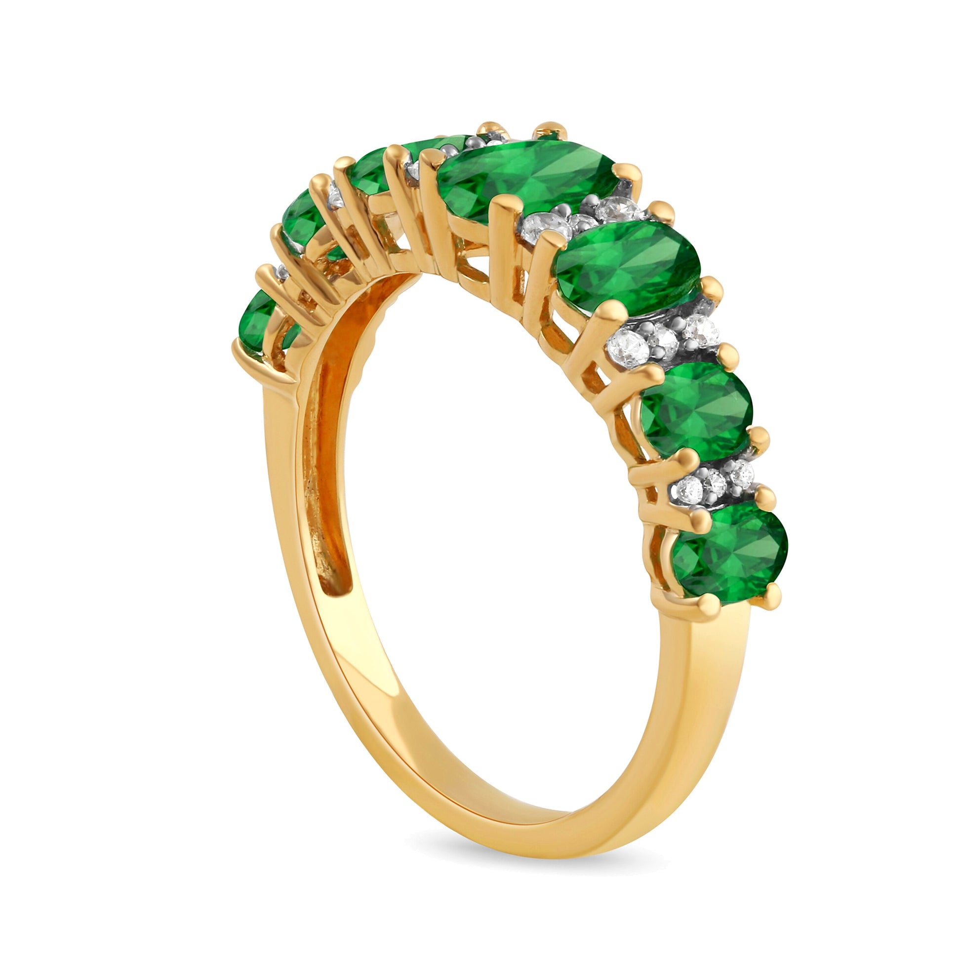 Oval Emerald and 0.13 CT. TW Diamond Graduated Seven Stone Alternating Trios Ring in 10K Gold