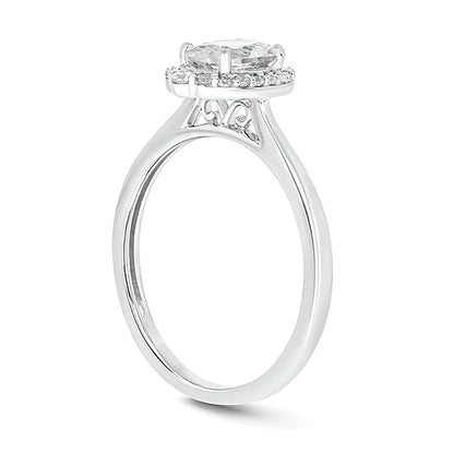 Oval White Lab-Created Sapphire and 0.17 CT. TW Diamond Frame Engagement Ring in 10K White Gold