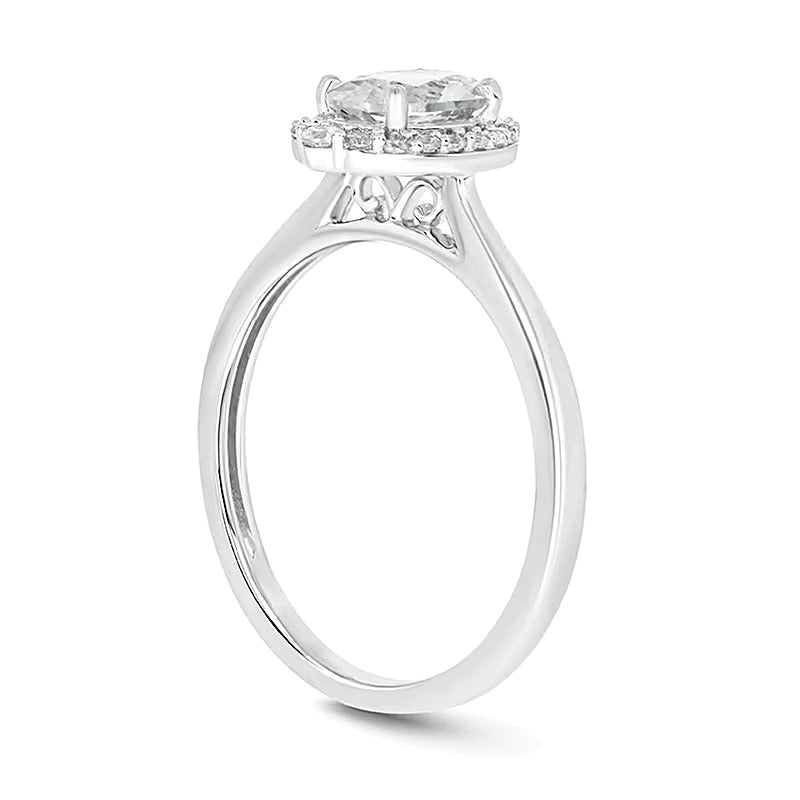Oval White Lab-Created Sapphire and 0.17 CT. TW Diamond Frame Engagement Ring in 10K White Gold