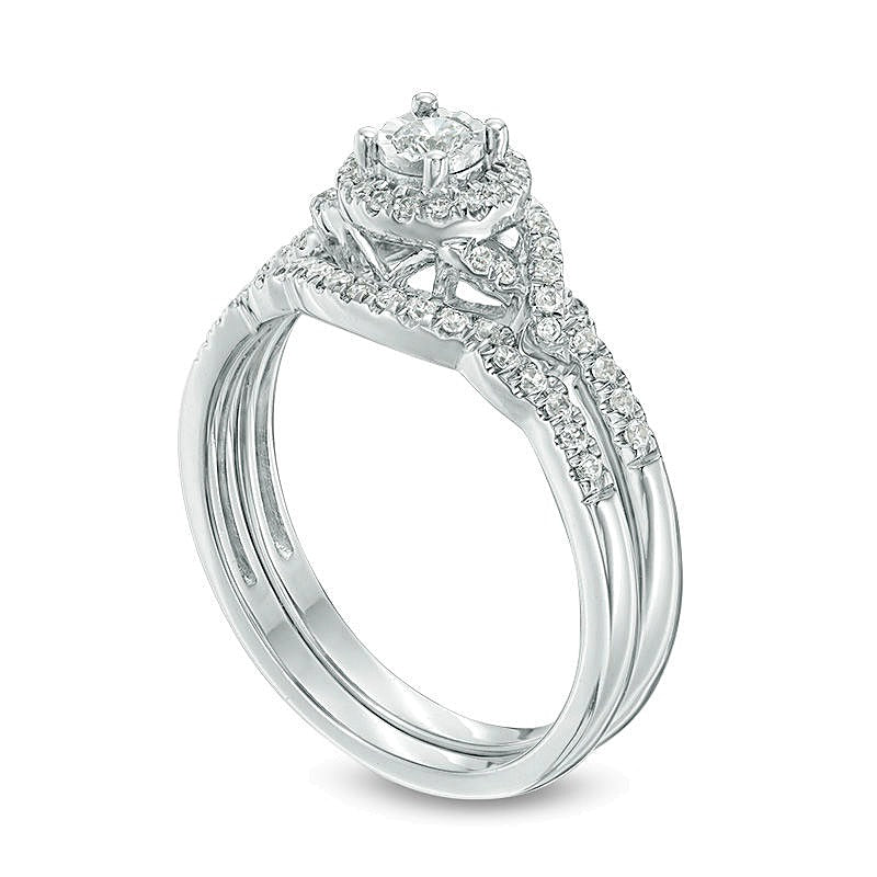 0.33 CT. TW Diamond Frame Twist Bridal Set in 10K White Gold
