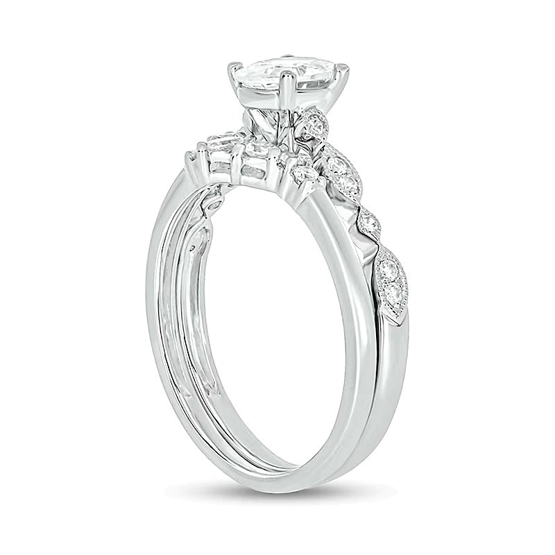 0.75 CT. TW Oval Diamond Contour Vintage-Style Bridal Set in 14K White Gold (I/I2)
