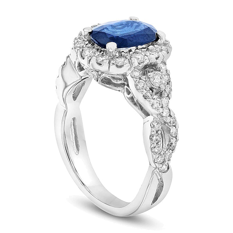 Oval Blue Sapphire and 0.75 CT. TW Diamond Frame Twist Shank Ring in 14K White Gold