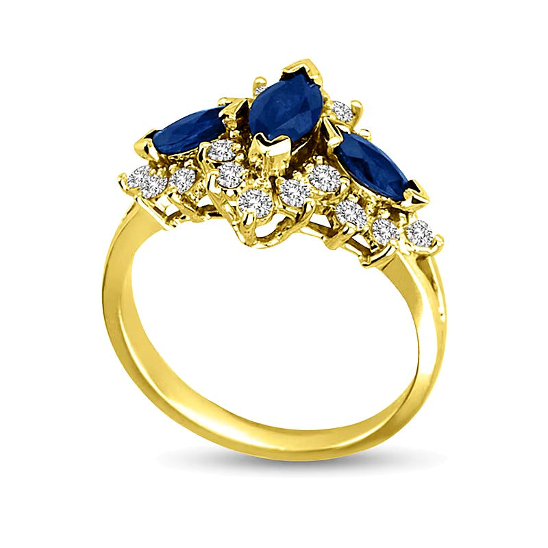 Marquise Blue Sapphire and 0.63 CT. TW Diamond Frame Three Stone Ring in 14K Gold