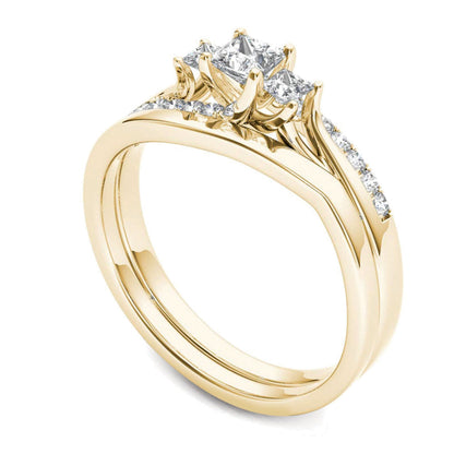 0.5 CT. TW Princess-Cut Diamond Three Stone Bypass Bridal Set in 14K Gold