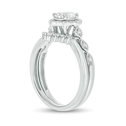 0.75 CT. TW Oval Diamond Frame Vintage-Style Bridal Set in 14K White Gold (I/I2)