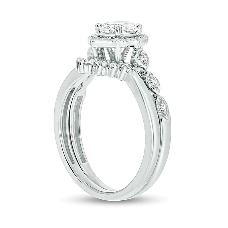 0.75 CT. TW Oval Diamond Frame Vintage-Style Bridal Set in 14K White Gold (I/I2)