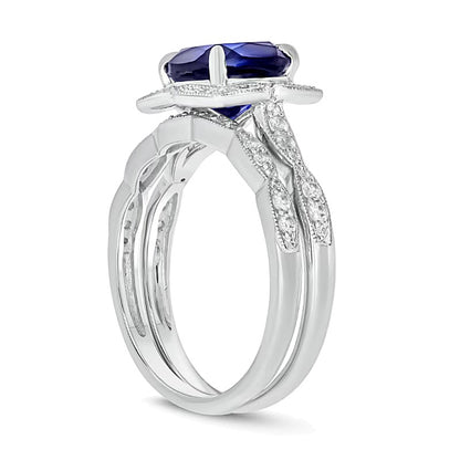 Cushion-Cut Blue Lab-Created Sapphire and 0.33 CT. TW Diamond Petal Frame Vintage-Style Bridal Set in Sterling Silver
