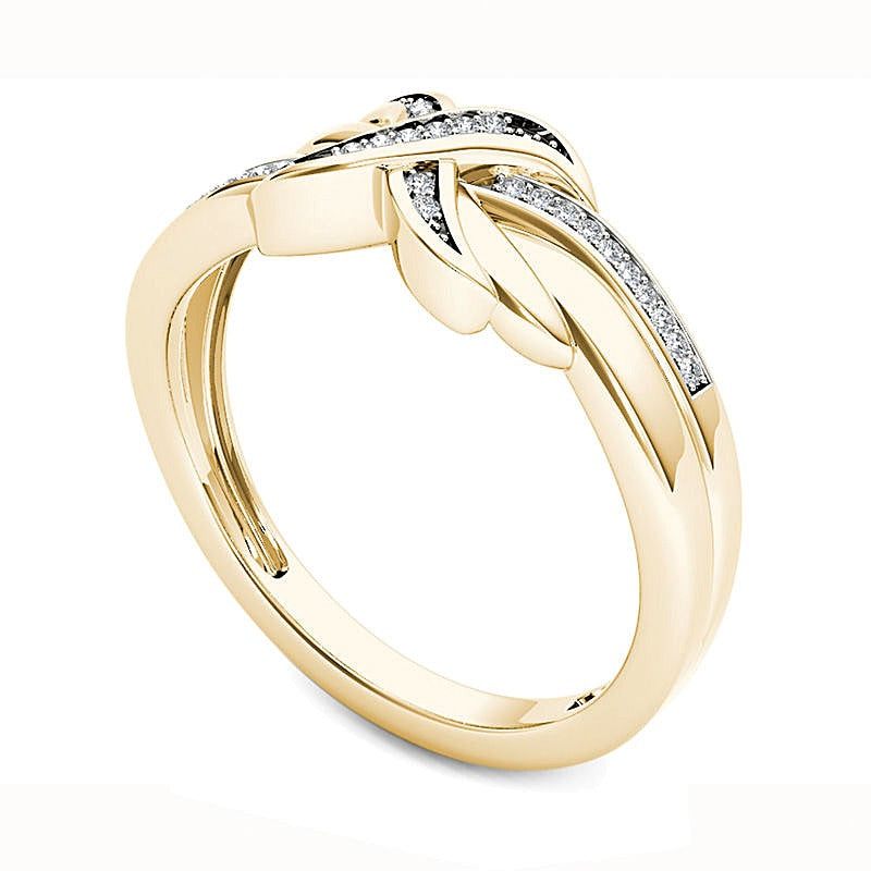 0.07 CT. TW Diamond "X" Ring in 10K Gold