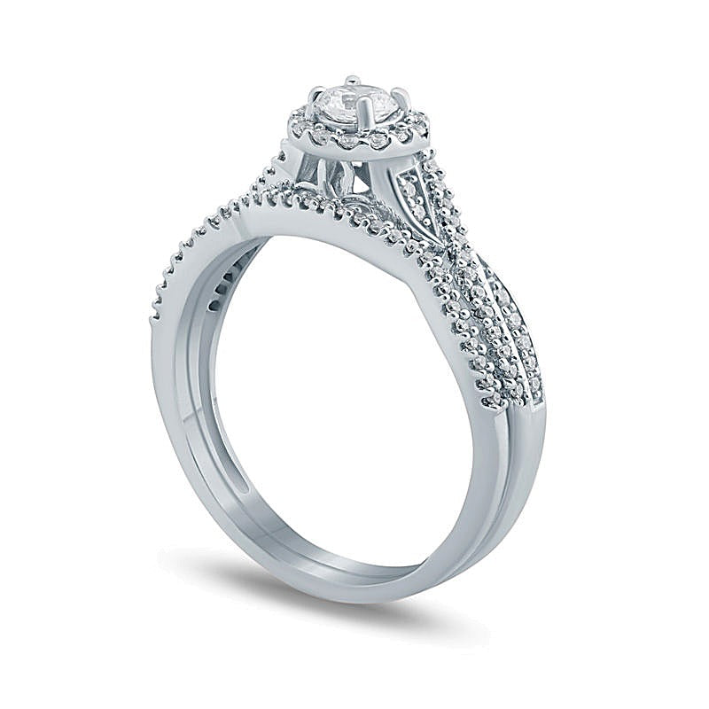0.5 CT. TW Diamond Frame Twist Bridal Set in 10K White Gold