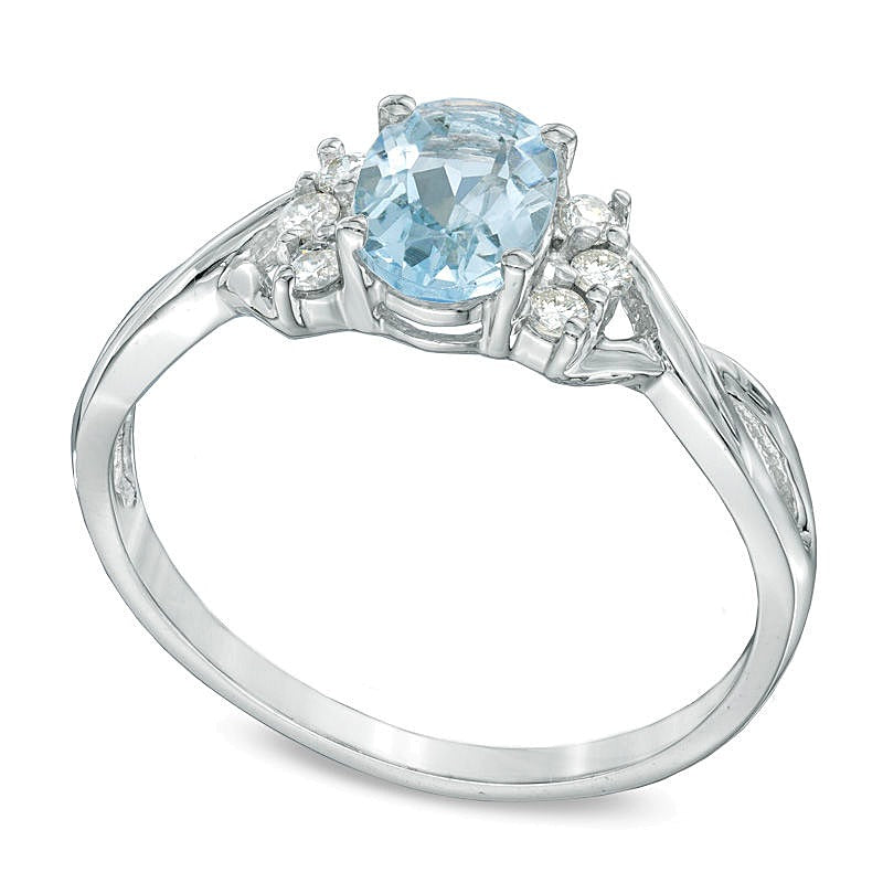 Oval Aquamarine and 0.13 CT. TW Diamond Ring in 10K White Gold