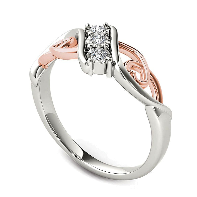 0.1 CT. TW Diamond Three Stone Bypass with Hearts Ring in 14K White Gold and Rose Rhodium