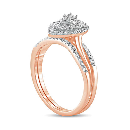 0.38 CT. TW Composite Diamond Pear-Shaped Double Frame Twist Shank Bridal Set in 10K Rose Gold