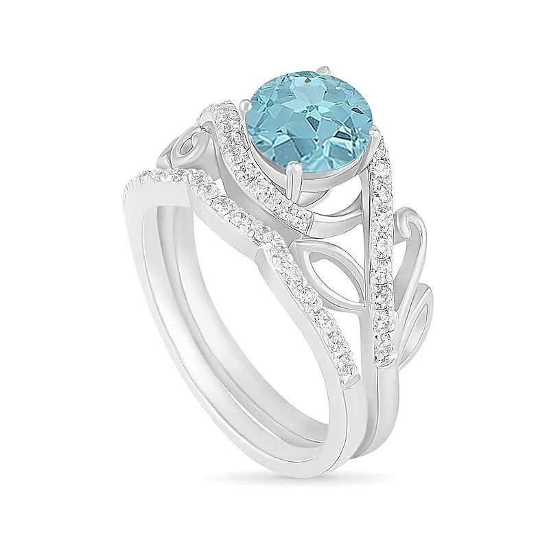 7.0mm Aquamarine and 0.38 CT. TW Diamond Bypass Leaf Shank Bridal Set in 10K White Gold