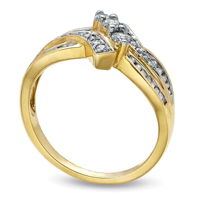 0.5 CT. TW Diamond Bypass Three Stone Ring in 10K Gold