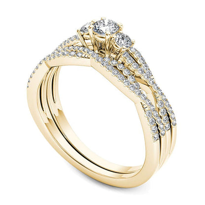 0.5 CT. TW Diamond Three Stone Twist Bridal Set in 14K Gold